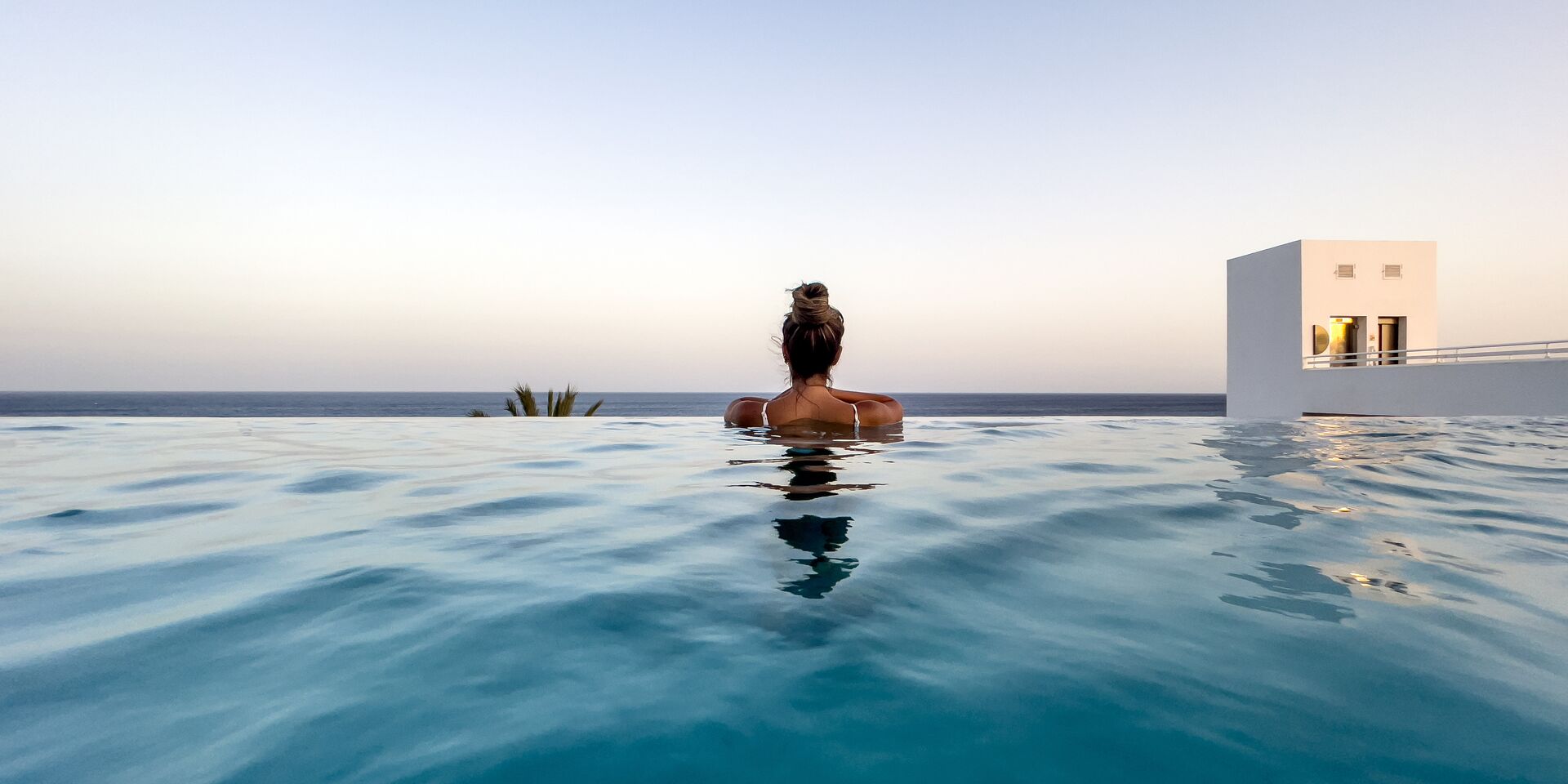 woman in infinity pool