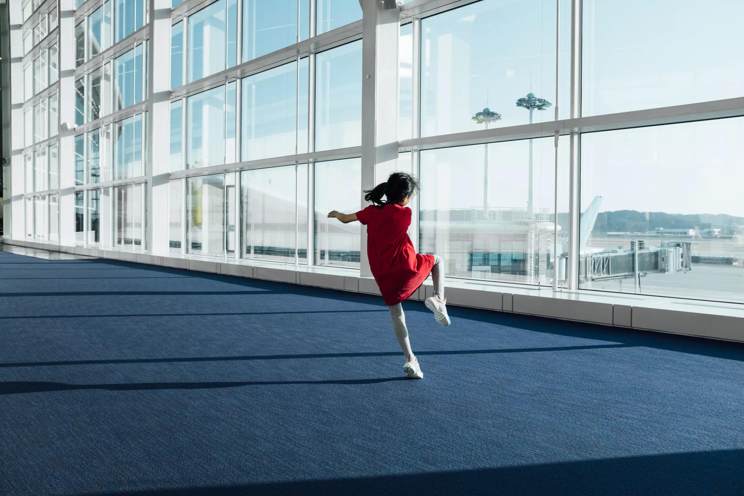 Girl-Dancing-Airport