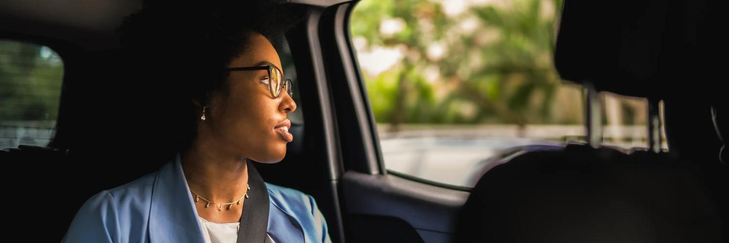 woman in uber car