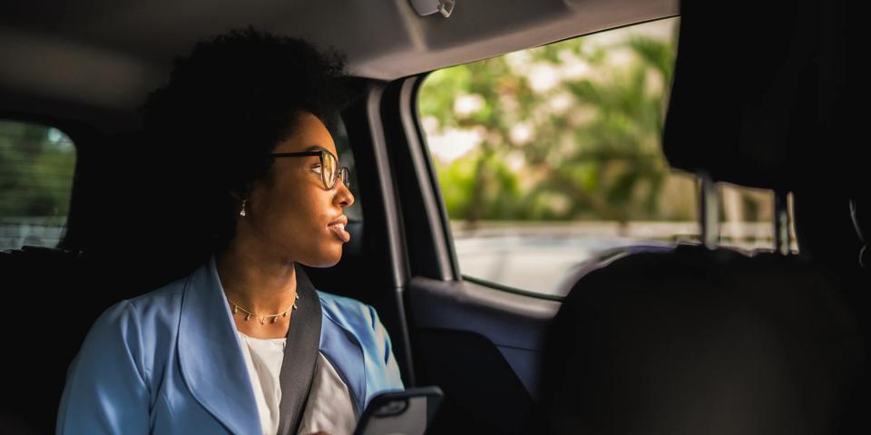 woman in uber car