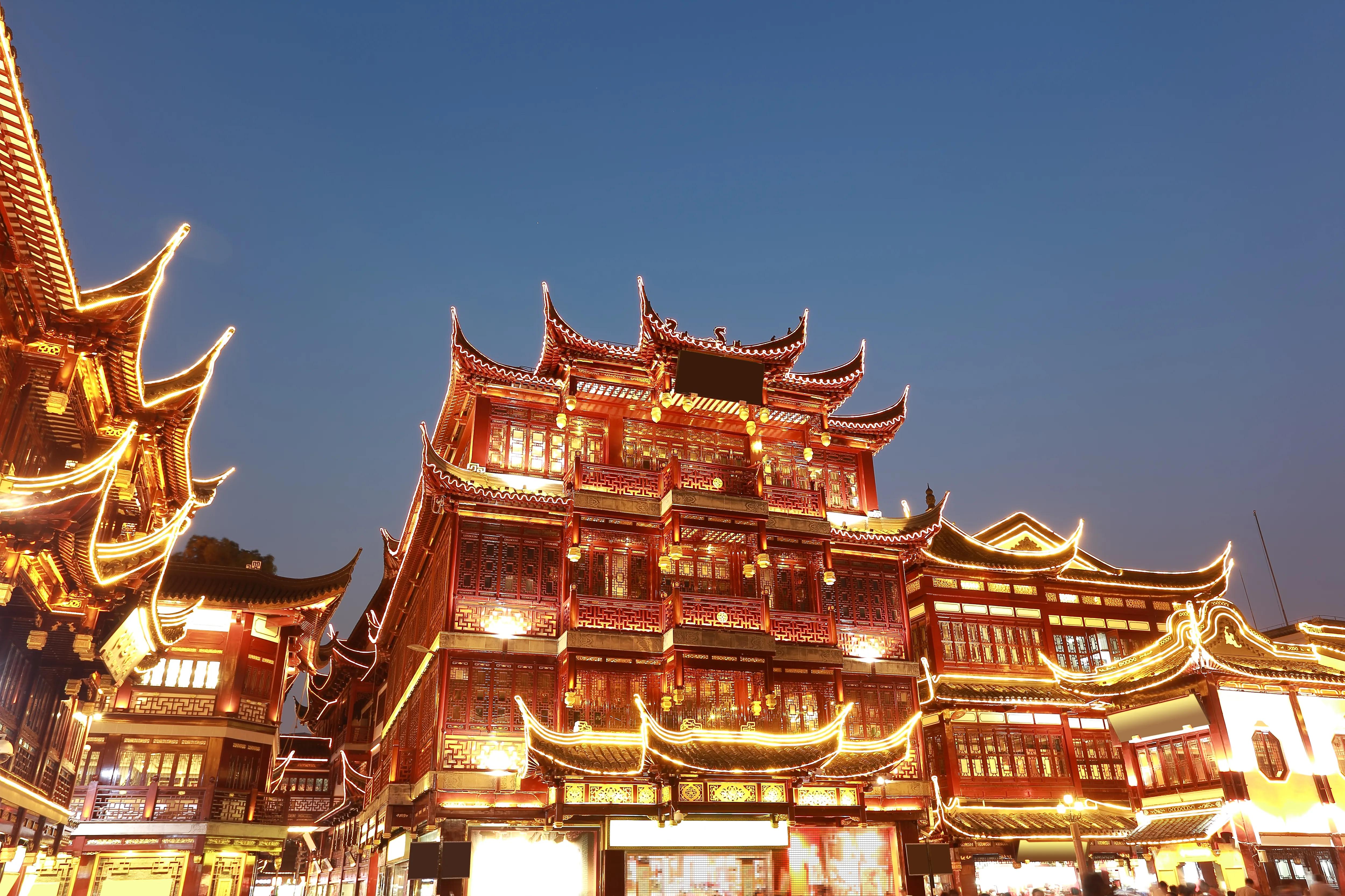 Chinese ancient classical architecture style of looking up night scene in Shanghai Yu Garden.