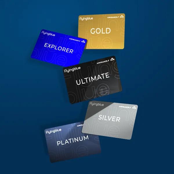 Flying Blue cards, from Explorer to Ultimate, fanned out against an Air France blue background, with a floating effect evoking lightness and travel.