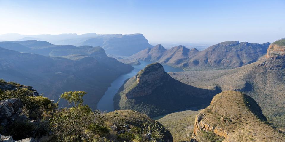 Johannesburg image with Blyde River Canyon and Three Rondawels peak, view of canyon with Blyde River and Table Mountains, canyon landscape in the evening light