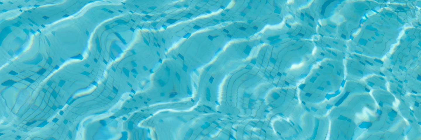 Lifestyle, crystal clear blue swimming pool water background with ripples